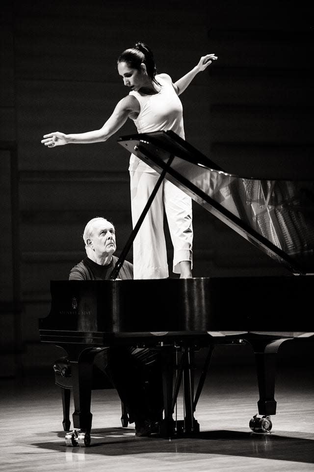 Leymis Bolaños Wilmott dances with composer Francis Schwartz at the piano in the Sarasota Contemporary Dance piece “Kinda’ Cage-y.”