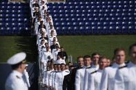 <p>Members of Class of 2018 enter the Navy-Marine Corps Memorial Stadium during a graduation ceremony at the U.S. Naval Academy May 25, 2018 in Annapolis, Md. (Photo: Alex Wong/Getty Images) </p>