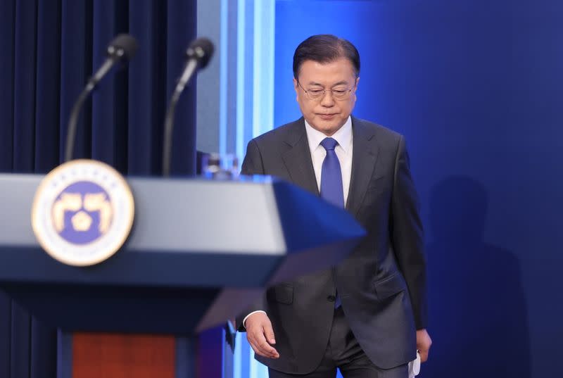 South Korean President Moon Jae-in arrives for a news conference at the Presidential Blue House in Seoul