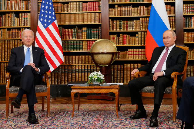 DENIS BALIBOUSE/POOL/AFP via Getty Images U.S. President Joe Biden, a critic of the Kremlin, meets with Russian President Vladimir Putin in Geneva in 2021