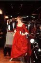 <div class="caption-credit">Photo by: Anwar Hussein/WireImage/Getty</div>In her third trimester with William, Diana attended a gala event in a custom Sassoon gown. The color was pure Diana red. And the cut, empire-waist with a full skirt, almost concealed the fact that she was with child.