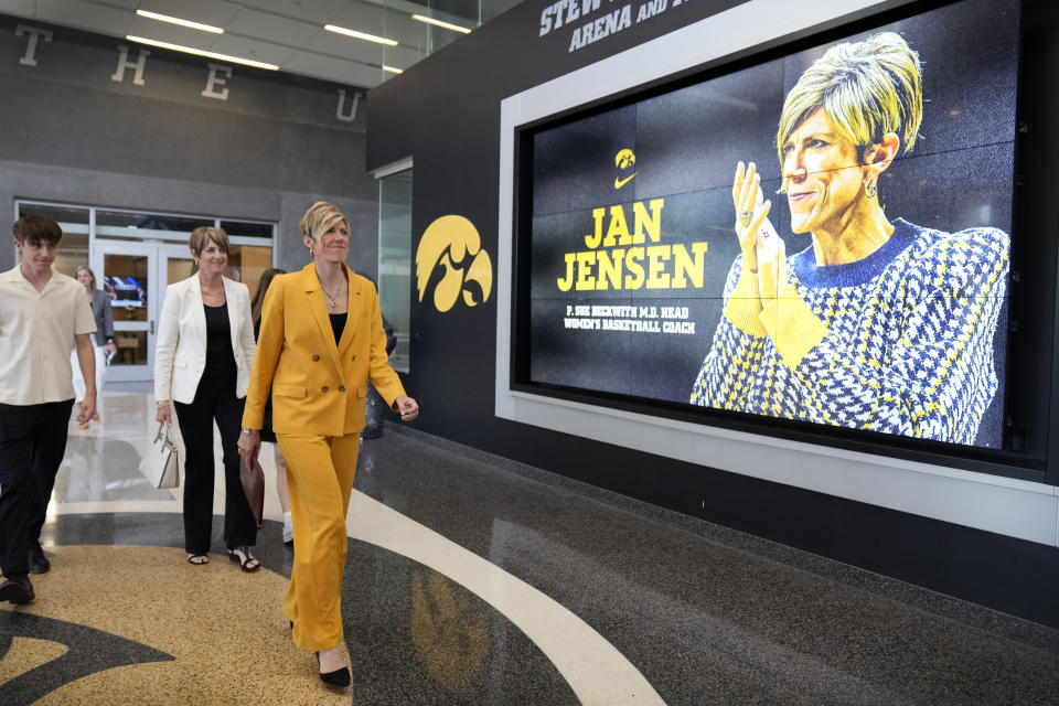 New Iowa women's basketball coach Jan Jensen arrives at a news conference, Wednesday, May 15, 2024, in Iowa City, Iowa. Jensen, who had been associate head coach at the school for 20 years, succeeds Lisa Bluder, who retired after 24 seasons and back-to-back trips to the NCAA championship game. (AP Photo/Charlie Neibergall)