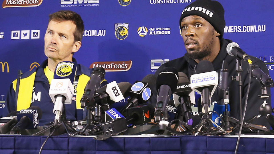 Usain Bolt and Mike Mulvey talk at the press conference during Usain Bolt’s first training session with the Central Coast Mariners. (Photo by Ashley Feder/Getty Images)