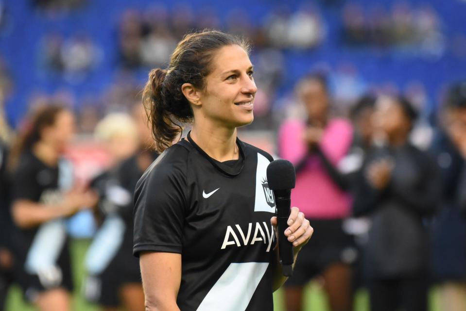 Carli Lloyd of Gotham FC talks to the crowd at the end of her final game in October.