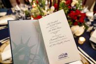 A table is set during a media preview for the State Dinner with President Joe Biden and French President Emmanuel Macron in the State Dining Room of the White House in Washington, Wednesday, Nov. 30, 2022. (AP Photo/Andrew Harnik)