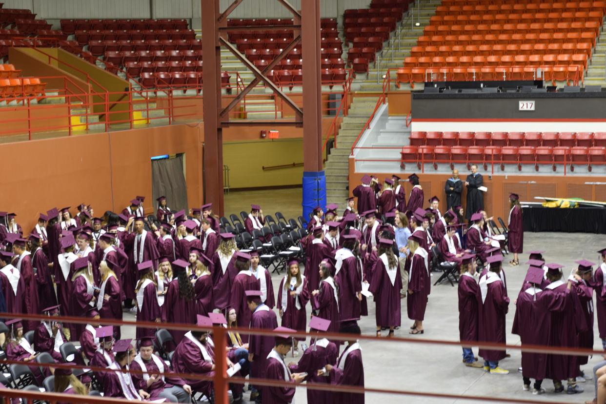 Members of the Salina Central High 2022 graduating class prepare for their commencement ceremony Sunday afternoon at Tony's Pizza Events Center.