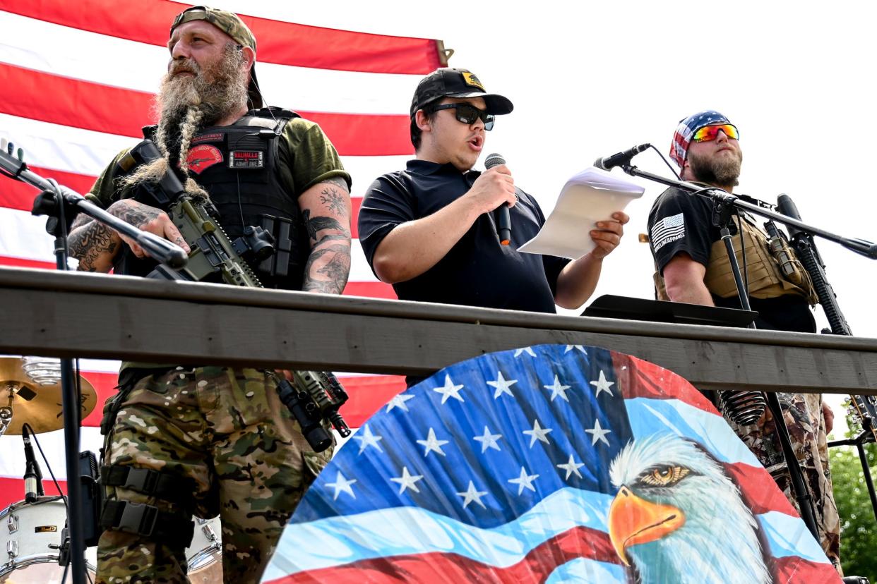 Kyle Rittenhouse, center, speaks during the 'Defend our 2A: Michigan's Right for Self Preservation' event on July 19, 2023, at Freedom Farms in Ionia Township. Rittenhouse is scheduled to speak at Kent State University on April 16.