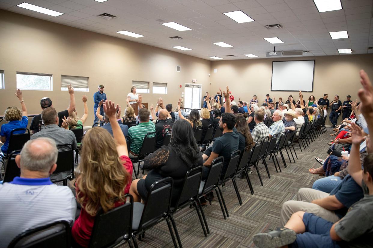 Community members and business owners listen to speakers during a public safety forum at Las Cruces Home Builders Association Event Hall on Thursday, June 2, 2022.