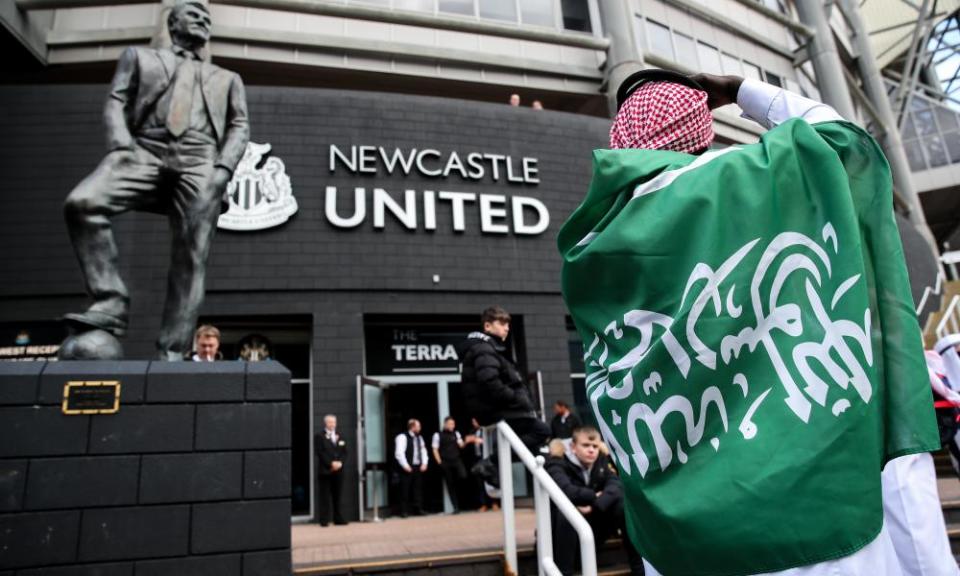 Newcastle fans celebrate the club's takeover