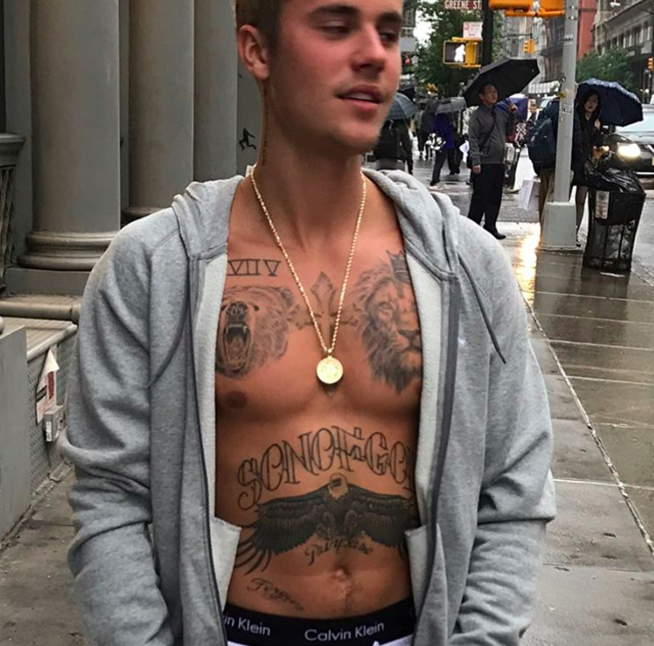 Justin Bieber shows off his new torso tattoos, while also plugging Calvin Klein undies, on May 23. (Photo: Justin Bieber via Instagram)