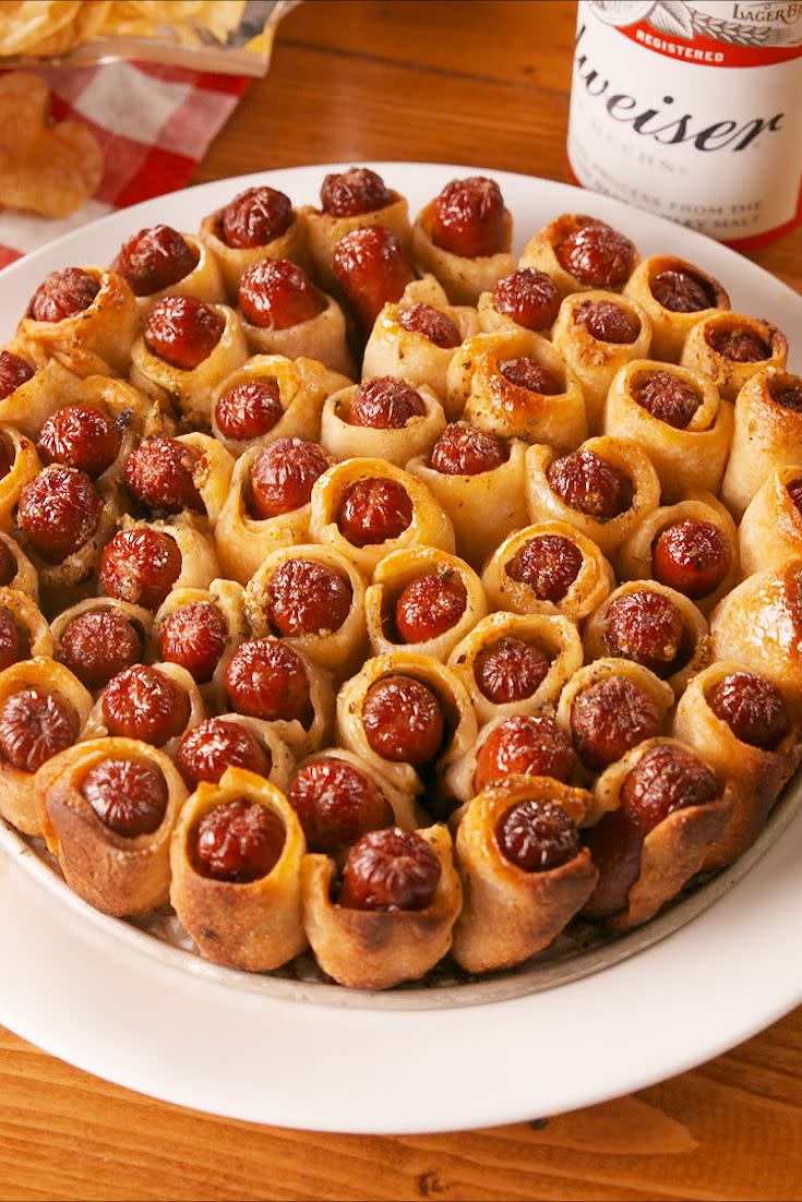 <p>These pigs are ready to paaartay!</p><p>Get the recipe from <a href="https://www.delish.com/cooking/recipe-ideas/a23460044/pull-apart-pigs-in-a-blanket-recipe/" rel="nofollow noopener" target="_blank" data-ylk="slk:Delish;elm:context_link;itc:0;sec:content-canvas" class="link ">Delish</a>.</p>