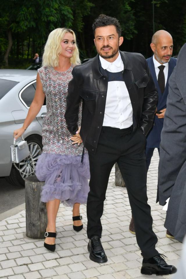 Katy Perry & Orlando Bloom look dashing at the Louis Vuitton show in Paris