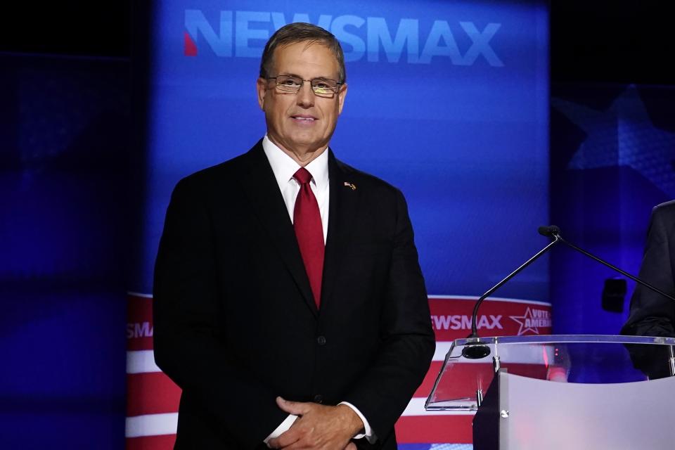 Arizona Republican US Senate candidates Jim Lamon poses for a photograph prior to the Arizona Republican Senate primary debate hosted by Newsmax at the Madison Center for The Arts Wednesday, July 13, 2022, in Phoenix. (AP Photo/Ross D. Franklin)