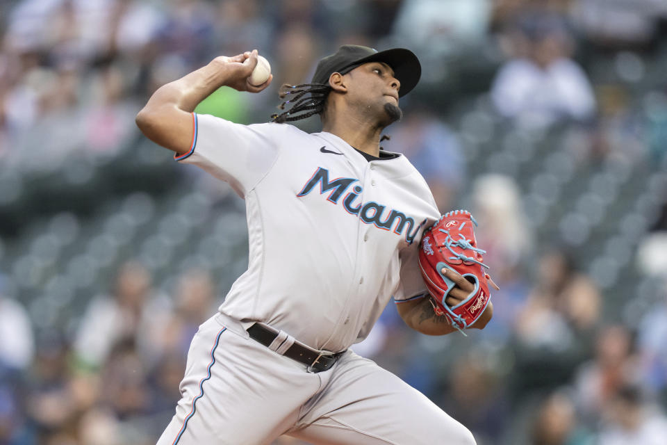 Miami Marlins starter Edward Cabrera throws during the second inning of the team's baseball game against the Seattle Mariners, Tuesday, June 13, 2023, in Seattle. (AP Photo/Stephen Brashear)