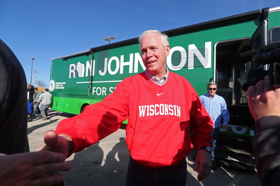 U.S. Senator Ron Johnson greets supporters at the kick off of his 10-day bus tour while campaigning for re-election for senate at an event in Franklin on Friday,.