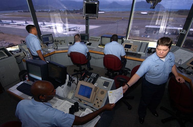 <span class="caption">Even air traffic control could be targeted by a cyber-attack on the IoT.</span> <span class="attribution"><a class="link " href="https://commons.wikimedia.org/wiki/File:US_Navy_040707-N-6932B-042_U.S._Navy_air_traffic_controllers_monitor_and_direct_the_launch_and_recovery_of_all_aircraft.jpg" rel="nofollow noopener" target="_blank" data-ylk="slk:US Navy;elm:context_link;itc:0;sec:content-canvas">US Navy</a></span>