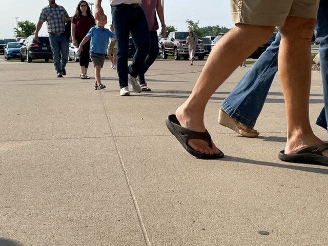 Members of Cornerstone Church walk into the service Sunday, June 4, 2023 to honor the anniversary of the killings of Eden Montang and Vivian Flores.