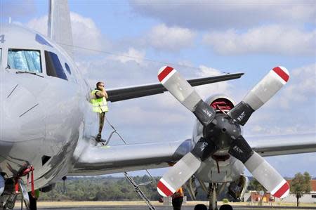 A Royal New Zealand Air Force (RNZAF) Orion aircraft prepares to take off from Royal Australian Air Force (RAAF) Base Pearce near Perth April 6, 2014. REUTERS/Richard Polden