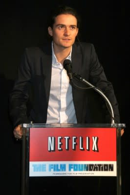 Netflix, Inc. (NASDAQ:NFLX), Sign, Logo, Brand, The Film Foundation, Orlando Bloom, red envelopes