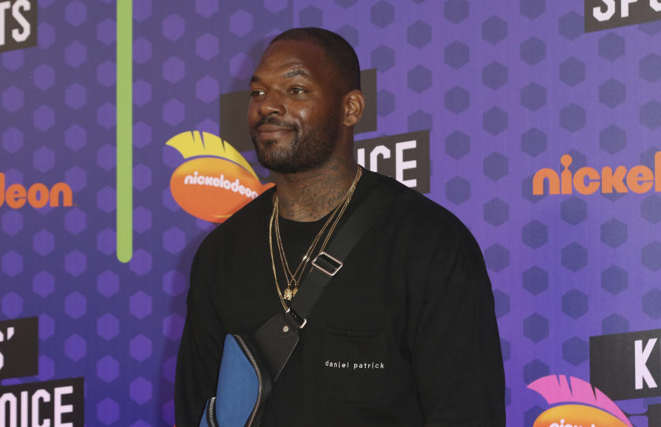 Recently-retired tight end Martellus Bennett compared Tom Brady and Aaron Rodgers during an interview on Thursday. (AP)