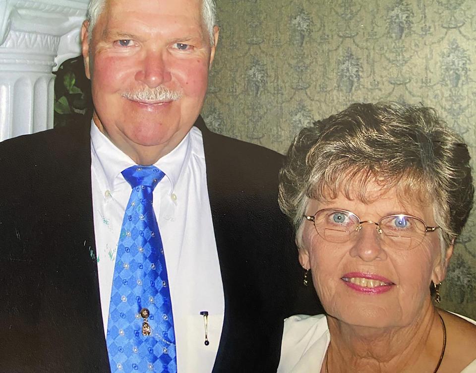 In this May 2006 photo provided by Sue Wagener shows Jack and Harriet Morrison at their 50th wedding anniversary party. The couple who had been together for nearly 65 years have died on the same day at a St. Louis area nursing home. The Morrison's beds were placed next to each other in their final hours, allowing them to hold hands, the St. Louis Post-Dispatch reports. Eighty-six-year-old Jack died first. Harriett, who was 83, died later on Jan. 11 2020. (Photo Courtesy Sue Wagener via AP)