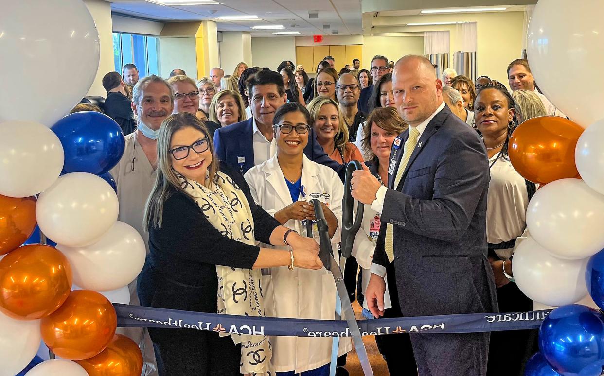 The staff of the HCA Florida Palms West Hospital, led by Dr. Gisella Diaz-Monroig (front row, left) and CEO Jason Kimbrell, cuts the ribbon on its new $6 million Level III NICU, or neonatal intensive-care unit, on Thursday, Feb. 2, 2023, at its campus in Royal Palm Beach.