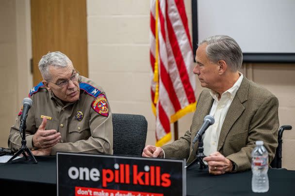 PHOTO: Texas Department of Public Safety Director Steve McCraw speaks with Gov. Greg Abbott at a news conference, Oct. 17, 2022, in Beaumont, Texas. (Brandon Bell/Getty Images)