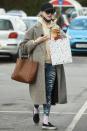 <p><em>Bridgerton</em> star Phoebe Dynevor takes a break from filming to pick up some food at a local supermarket on Saturday in the U.K.</p>