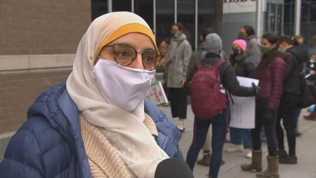 Samira Laouni joined about 20 demonstrators in Montreal on Tuesday outside Legault's office. 'With this law, we are curtailed in our rights and freedoms,' she said.