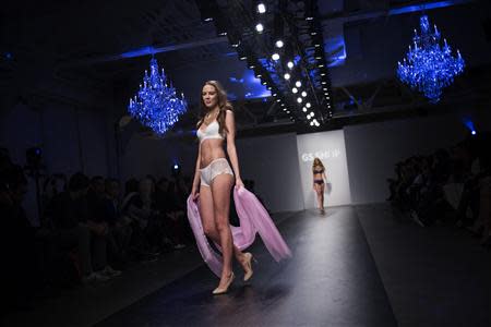 A model presents a creation from the GS Shop Lingerie Show featuring Wonderbra, Anna Sui and Spanx Fall 2014 collections during New York Fashion Week February 4, 2014. REUTERS/Eric Thayer