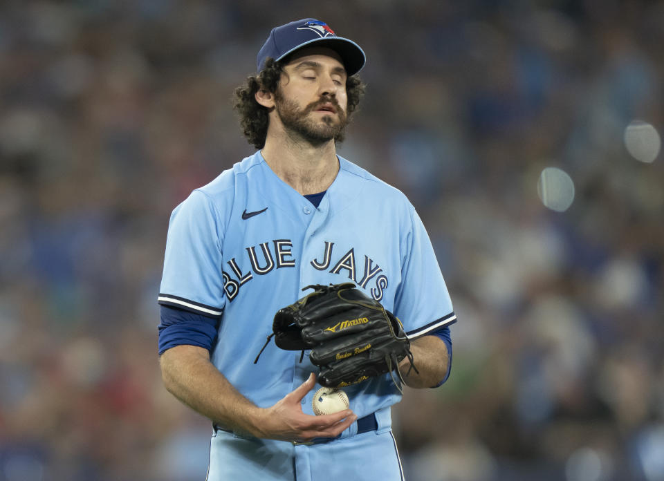 Toronto Blue Jays pitcher Jordan Romano reacts after giving up solo homer to Boston Red Sox Alex Verdugo during the ninth inning of a baseball game in Toronto, Sunday, July 2, 2023. (Frank Gunn/The Canadian Press via AP)