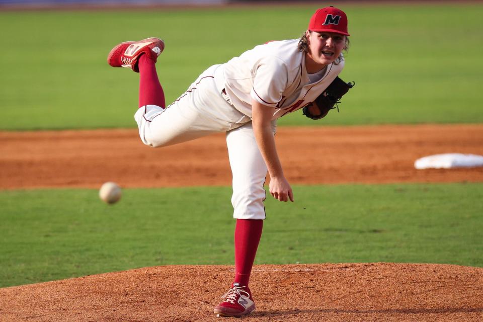 McCracken County's Ross Aldridge (14) pitches the ball during the Trinity vs. McCracken County KHSAA State Baseball Tournament championship game on Saturday, June 19, 2021, at Whitaker Bank Ballpark in Lexington, Kentucky.