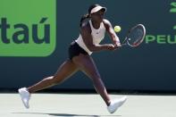 Mar 29, 2018; Key Biscayne, FL, USA; Sloane Stephens of the United States hits a backhand against Victoria Azarenka of Belarus (not pictured) in a women's singles semi-final of the Miami Open at Tennis Center at Crandon Park. Mandatory Credit: Geoff Burke-USA TODAY Sports