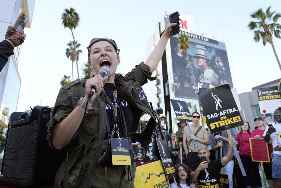 SAG-AFTRA captain Mary M. Flynn rallies fellow striking actors on a picket line outside Netflix studios, Wednesday, Nov. 8, 2023, in Los Angeles. (AP Photo/Chris Pizzello)