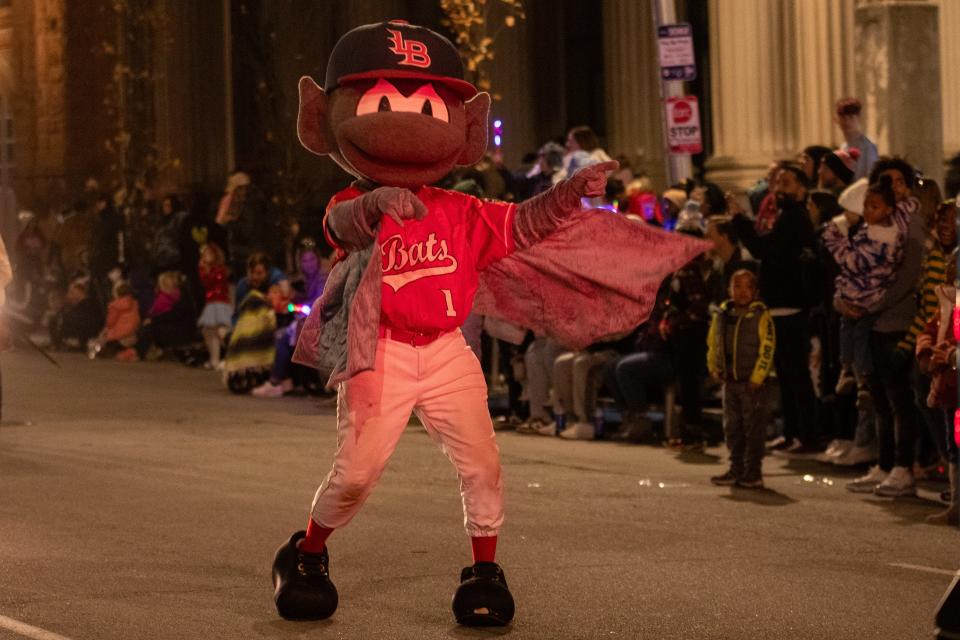 Dec 2, 2023; Louisville, KY, USA; Buddy the Bat walked in the Lots of Lights parade at Jefferson Square Park. Mandatory Credit: Michelle Hutchins-The Courier-Journal