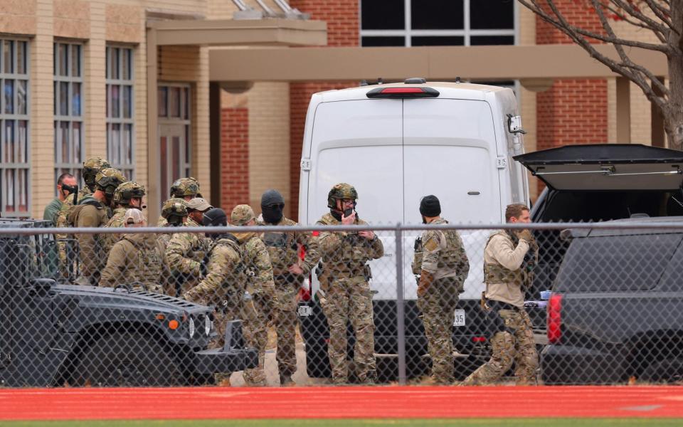 Police SWAT teams assembled outside the synagogue - GETTY IMAGES