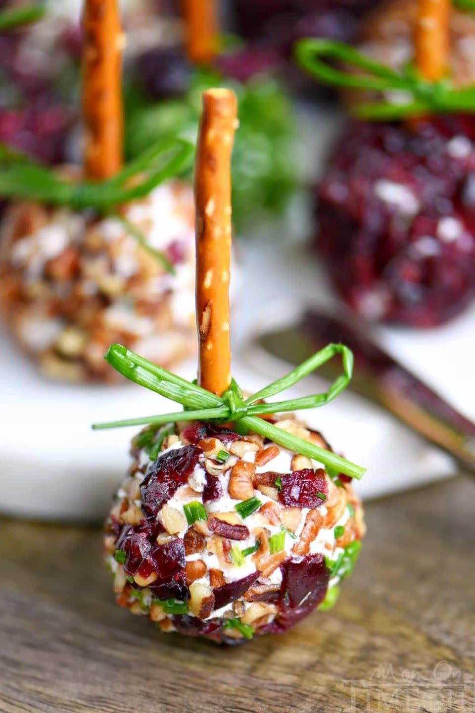 <p>Keep your Thanksgiving guests satisfied with these adorable cheese bites.</p><p><strong>Get the recipe at <a href="http://www.momontimeout.com/2016/11/cranberry-pecan-mini-goat-cheese-balls/" rel="nofollow noopener" target="_blank" data-ylk="slk:Mom on Timeout;elm:context_link;itc:0;sec:content-canvas" class="link ">Mom on Timeout</a>. </strong></p>