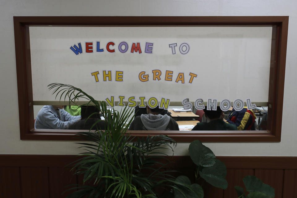 In this Nov. 6, 2019, photo, students sit in the classroom at the alternative Great Vision School in Uijeongbu, South Korea. After North Korean women sneaked into China in search of food or jobs, they were often sold to poor Chinese farmers by human traffickers. Some of these couples later moved to South Korea along with their half-North Korean, half-Chinese children. In South Korea, these children often face an identity crisis, a language barrier and poor state assistance programs. (AP Photo/Lee Jin-man)