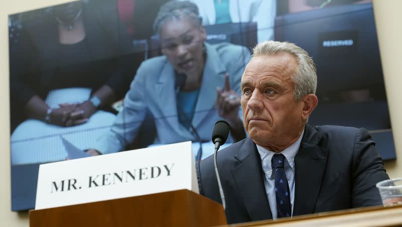 Democratic presidential candidate Robert F. Kennedy Jr. listens as Maya Wiley, president and CEO of the Leadership Conference on Civil and Human Rights, is seen on a screen while she testifies before a House Judiciary Select Subcommittee on the Weaponization of the Federal Government hearing on Capitol Hill in Washington, Thursday, July 20, 2023.