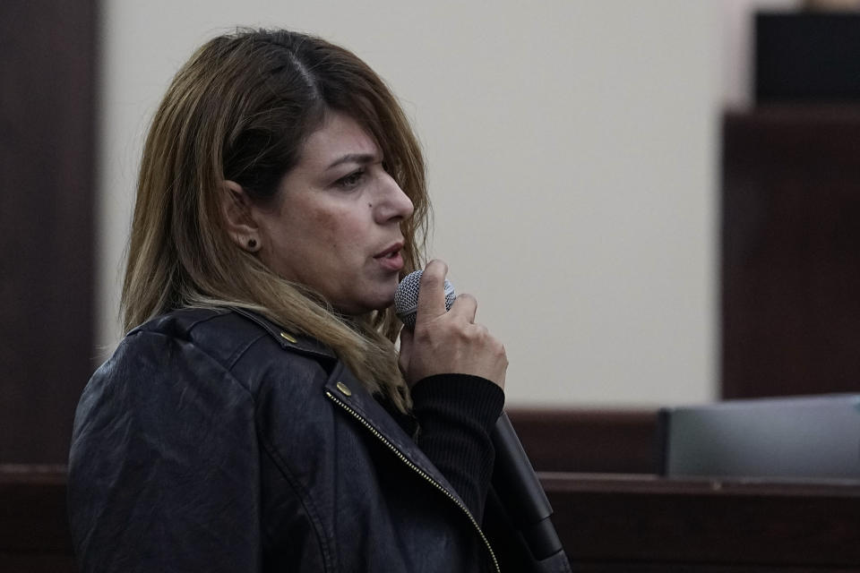 Irma Reyes makes a statement in Judge Velia Meza's courtroom Monday, Jan. 23, 2023, in San Antonio. Reyes feels like "collateral damage" in the plea deal that let the two men charged with sex trafficking her teenage daughter walk free. (AP Photo/Eric Gay)