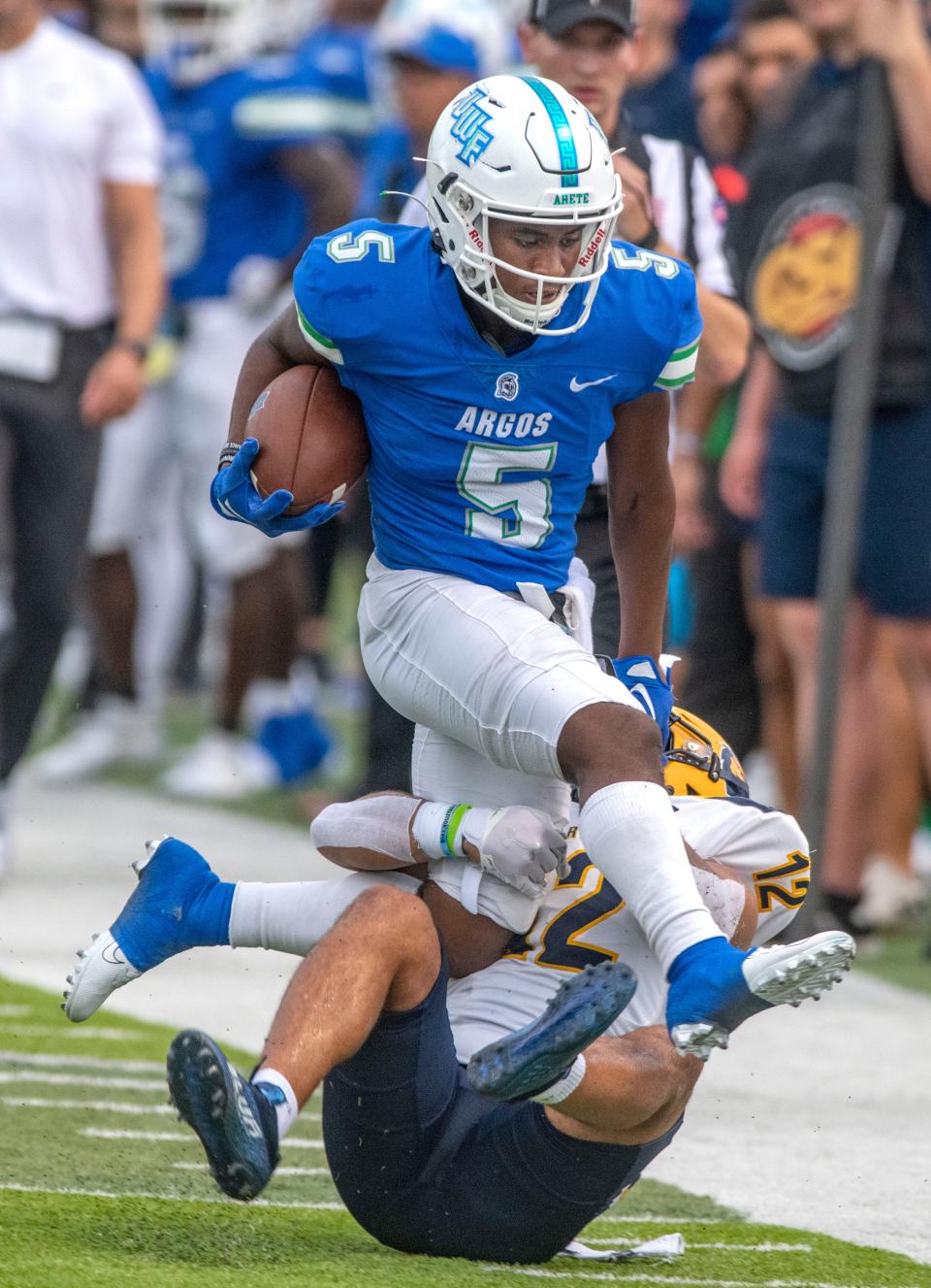 West Florida's Shomari Mason runs down field during the inaugural football season at Pen Air Field the the University of West Florida, Saturday, September 3, 2022.