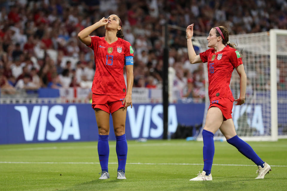 Alex Morgan sipped some imaginary tea after scoring the USWNT's second goal against England. (Photo by Catherine Ivill - FIFA/FIFA via Getty Images)