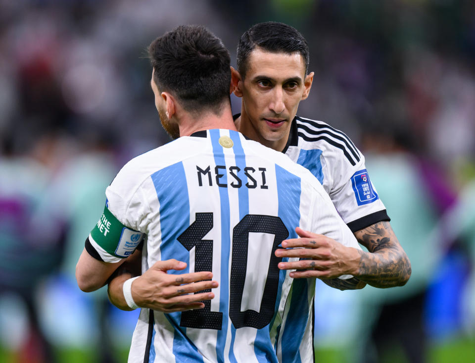 LUSAIL CITY, QATAR - NOVEMBER 26: Lionel Messi (L) of Argentinia celebrates with Angel Di Maria (R) the victory during the FIFA World Cup Qatar 2022 Group C match between Argentina and Mexico at Lusail Stadium on November 26, 2022 in Lusail City, Qatar. (Photo by Markus Gilliar - GES Sportfoto/Getty Images)