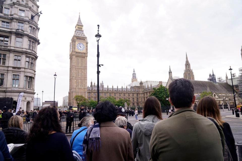 Members of the public ahead of the ceremonial procession of the coffin of Queen Elizabeth II from Buckingham Palace to Westminster Hall (PA)