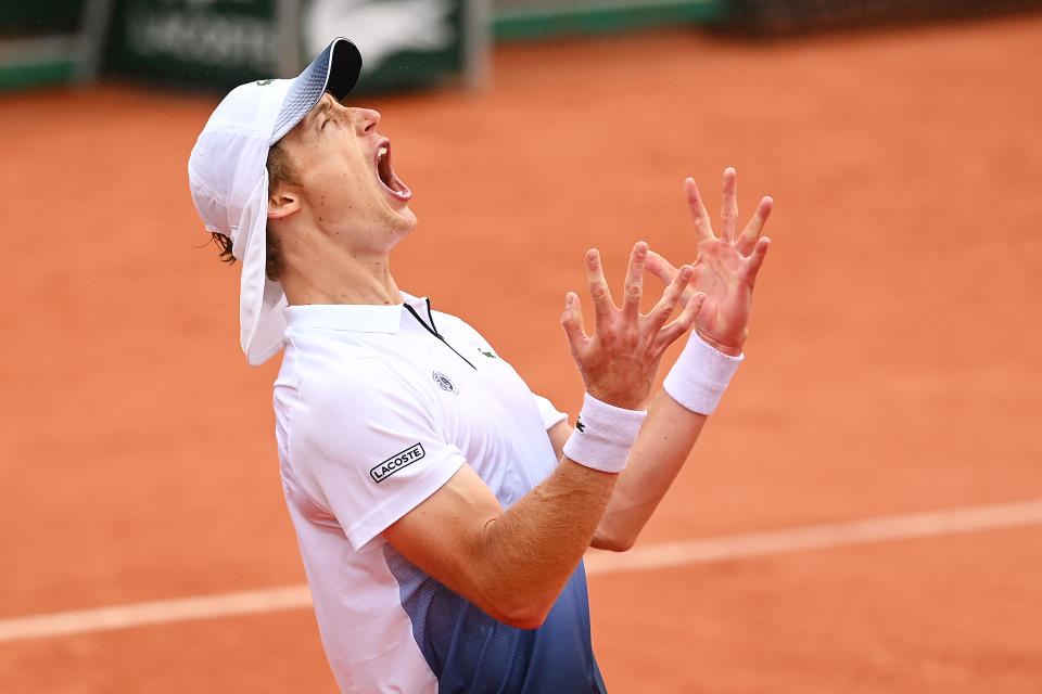 Marc Polmans celebrates after winning match point during his Men's Singles first round match against Ugo Humbert on day three of the 2020 French Open.