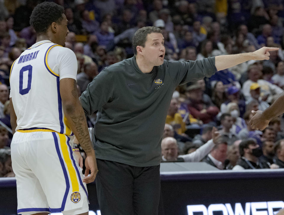 LSU head coach Will Wade, right, talks to LSU guard Brandon Murray (0) during the second half of an NCAA college basketball game against Tennessee in Baton Rouge, La., Saturday, Jan. 8, 2022. (AP Photo/Matthew Hinton)