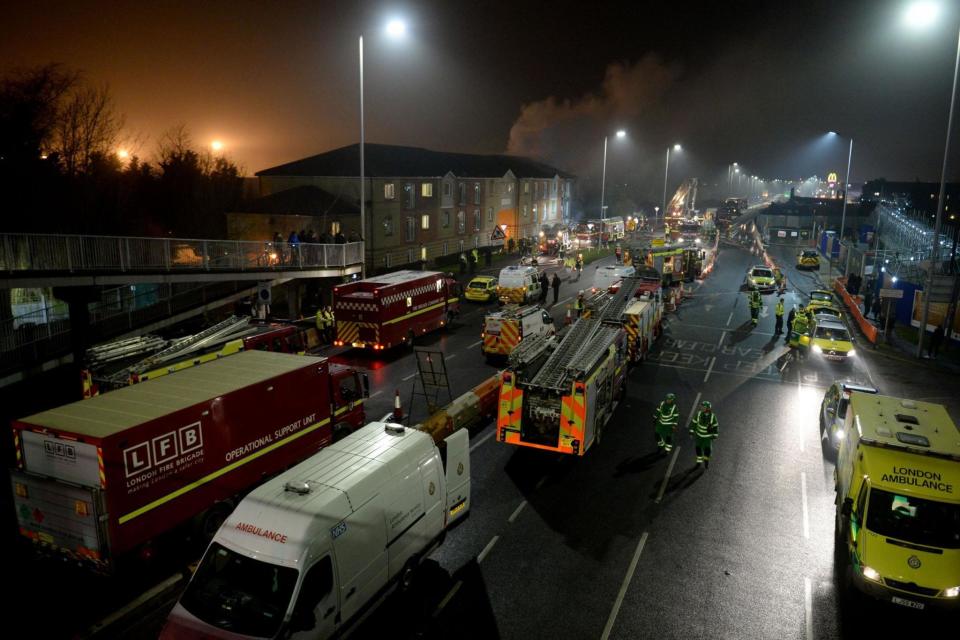 Taped off: Police, fire engines and ambulances all raced to the scene (PA)