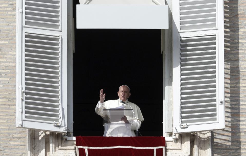 Pope Francis delivers his message during his Angelus prayer from his studio window overlooking St. Peter's Square, at the Vatican, Sunday, Nov. 10, 2019. (AP Photo/Gregorio Borgia)