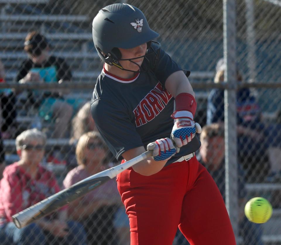 Rossville Hornets Avery Layton (21) swings at the ball during the IHSAA softball game against the Harrison Raiders, Wednesday, April 12, 2023, at Harrison High School in West Lafayette, Ind. Harrison won 6-4.