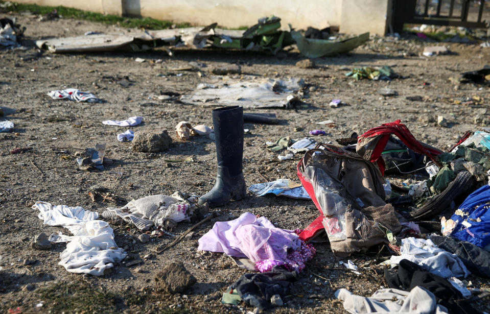 Passengers' belongings are pictured at the site where the Ukraine International Airlines plane crashed after take-off from Iran's Imam Khomeini airport, on the outskirts of Tehran, Iran January 8, 2020. Nazanin Tabatabaee/WANA (West Asia News Agency) via REUTERS